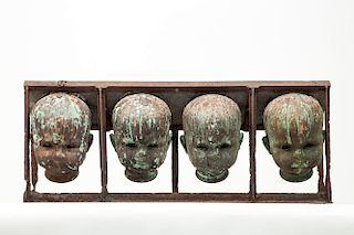 20th Century School: Untitled (Four Molds of Heads)