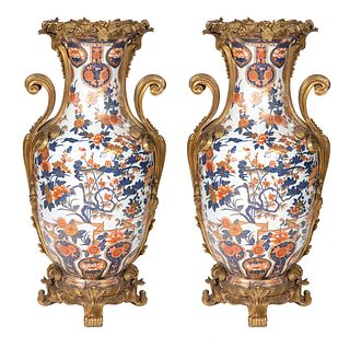 A PAIR OF CHINESE ORMOLU-MOUNTED PORCELAIN VASES, 20TH CENTURY