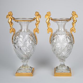 A PAIR OF FRENCH OR RUSSIAN ORMOLU-MOUNTED TWO-HANDLED CRYSTAL VASES, 19TH CENTURY