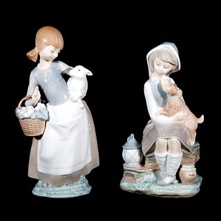 Two Lladro porcelain children.