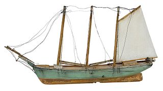A Carved and Painted Wooden Ship Model