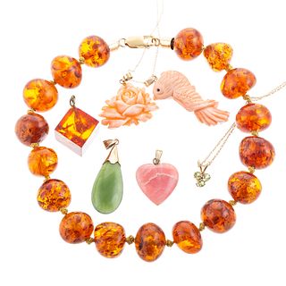 A Collection of Gold, Amber, Jade & Coral Jewelry
