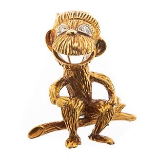 A Whimsical Monkey Pin with Diamond Eyes in 18K
