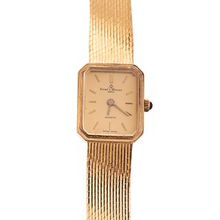 A Lady's 14K Yellow Gold Baume & Mercier Watch