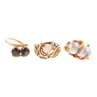 A Trio Gold Rings in Pearl, Opal & Star Sapphire