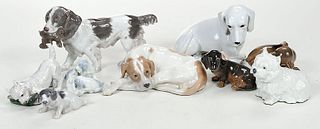 Nine Assorted Porcelain Dog Figures