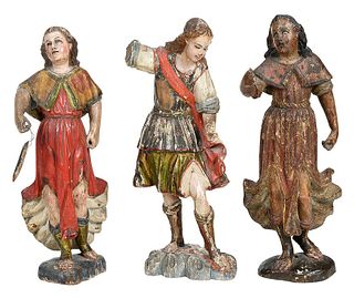 Three Carved and Polychromed Santos Figures
