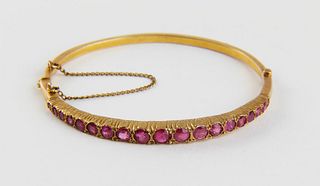 Lady's 14k Yellow Gold Hinged Ruby Bangle Bracelet