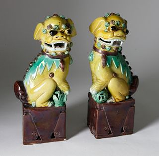 Pair Of Polychrome Underglaze Porcelain Male And Female Foo Dogs, 19th Century