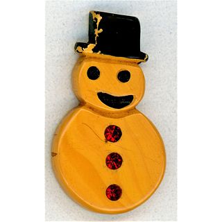 A CHUNKY BAKELITE REALISTIC SHAPED SNOWMAN BUTTON