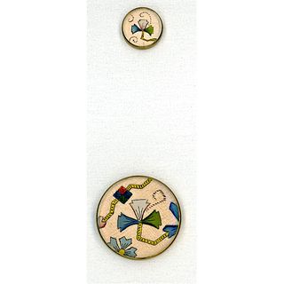 A PAIR OF LATE 19TH C. DESIGN UNDER GLASS BUTTONS