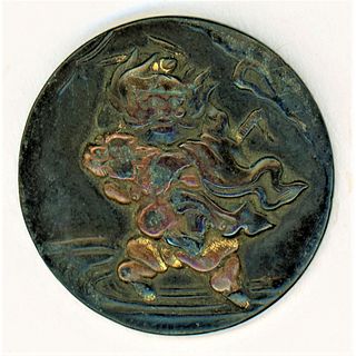 A 19TH CENTURY SHAKUDO METAL BUTTON WITH ONI DEPICTED