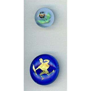 2 20TH CENTURY GLASS PAPERWEIGHT BUTTONS.