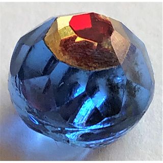 A FACETED BLUE BALL TINGUE GLASS BUTTON