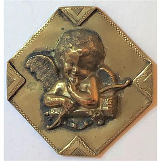 A DIVISION ONE HANDKERCHIEF CORNER WINGED CUPID BUTTON