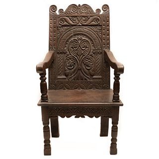 Antique Elizabethan Century carved English arm chair