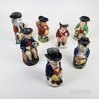 Seven Staffordshire Ceramic Toby Jugs