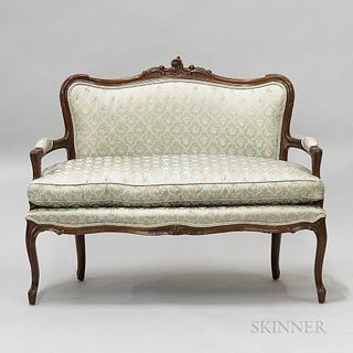 French Provincial-style Carved and Upholstered Fruitwood Settee