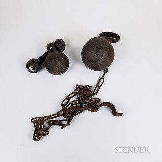 Three Cast Iron Weights and a Chain.