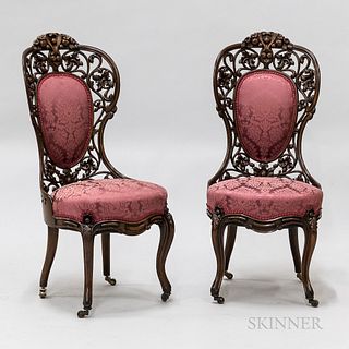 Pair of Rococo Revival Carved and Laminated Rosewood Side Chairs.