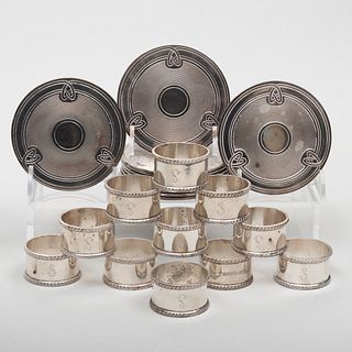 Set of Eleven Tiffany & Co. Silver Napkin Rings and a Set of Eleven Christofle Silver Plate Coasters