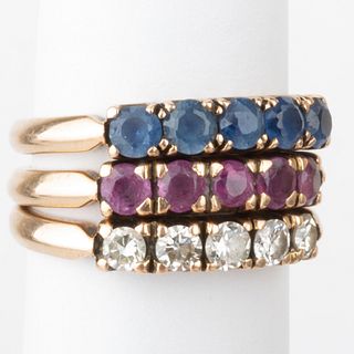 14k Gold and Diamond Ring, a 14k Gold and Sapphire Ring, and a 14k Gold and Ruby Ring