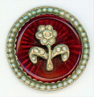 A SCARCE AND BEAUTIFUL RED GLASS BACKGROUND BUTTON