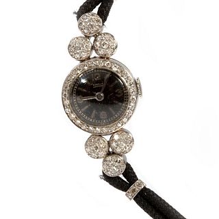 Gubelin diamond, platinum and cord ladies wristwatch