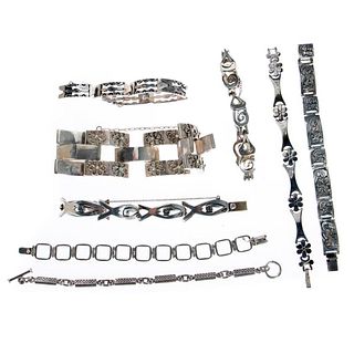 Eight sterling silver link bracelets