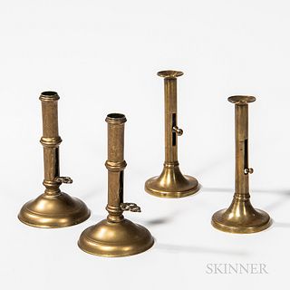 Two Pairs of Early Brass Push-up Candlesticks