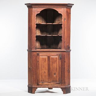 Carved and Paneled Pine Two-piece Corner Cupboard
