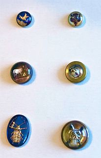 A SELECTION OF 6 REVERSE INTAGLIO DUG BUTTONS IN METAL
