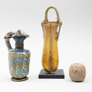 Glass Trefoil-Lipped Oinochoe, a Rainbow Glass Bead, and an Ancient Roman Yellow Glass Double Cosmetic Tube