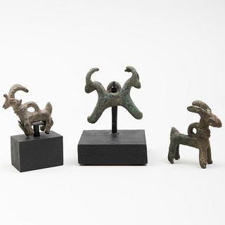 Group of Three Luristan Bronze Ibex Amulets