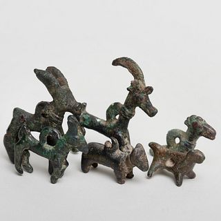 Group of Six Luristan Bronze Amulets