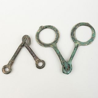 Two Patinated Bronze Horse Bits