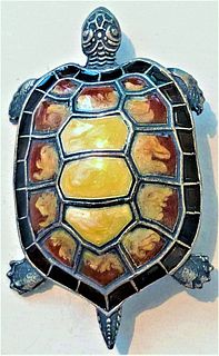 A DIVISION THREE REALISTIC ENAMELED WHITE METAL TURTLE
