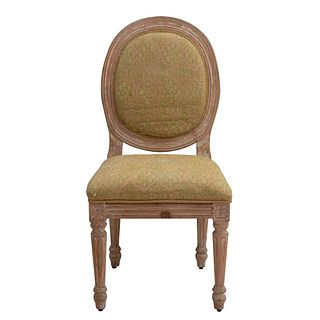 Chair. 20th century. Carved in wood. Closed oval backrest and seat in green upholstery, architectural shafts.