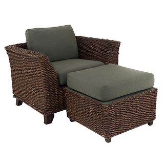 Armchair and stool. 20th century. Made of wood and woven wicker. Dark gray upholstery.