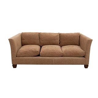 Sofa. 20th century. Carved in wood. Beige upholstery, closed backrests, cushioned seats.