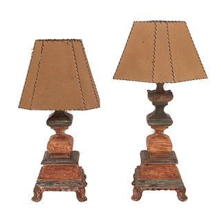 Two table lamps. 20th century. Polychrome wood, with leather-like screen.