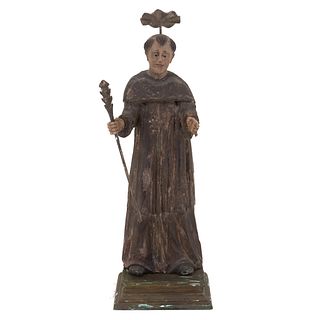 Martyred saint. Early 20th century. Polychrome wood, with base.
