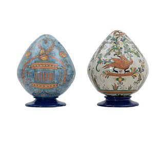 Lot of 2 decorative elements. Mexico. 20th century. Ovoid design. Made in talavera. Decorated with plant, floral, organic elements.