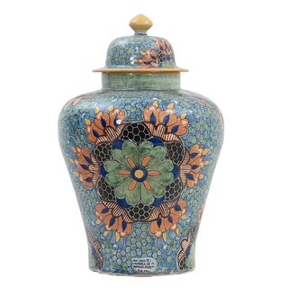 Tibor. Mexico. 20th century. Made in De la Reyna talavera. Decorated with plant, floral, and geometric elements.