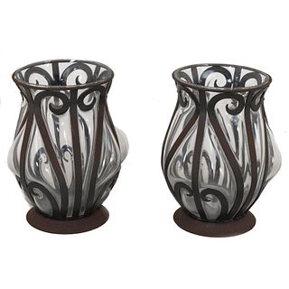 Pair of vases. 20th century. Glass and ironwork. Decorated with organic elements.