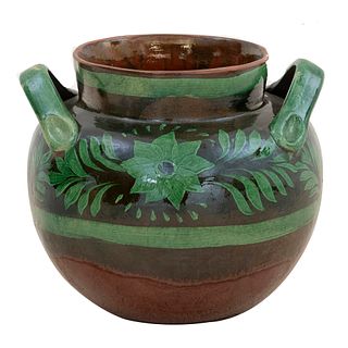 Pot. 20th century. Made of terracotta. Decorated with plant, floral, and organic elements in green color.