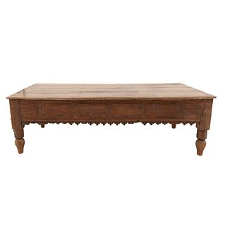 Coffee table. 20th century. Carved in wood. Rectangular top, decorated with floral elements.