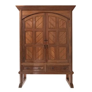 Wardrobe. 20th century. Carved in wood. With 2 folding doors, 2 drawers with handles.