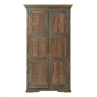Wardrobe. 20th century. Carved in wood. Two hinged doors, decorated with openwork and organic elements.