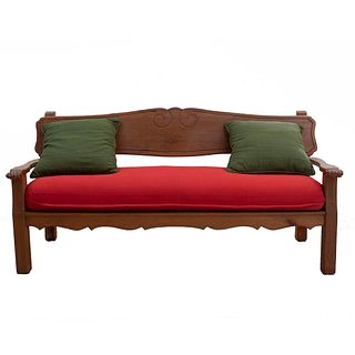 Sofa. 20th century. Wooden carving. With closed backrest, padded seat in red upholstery.